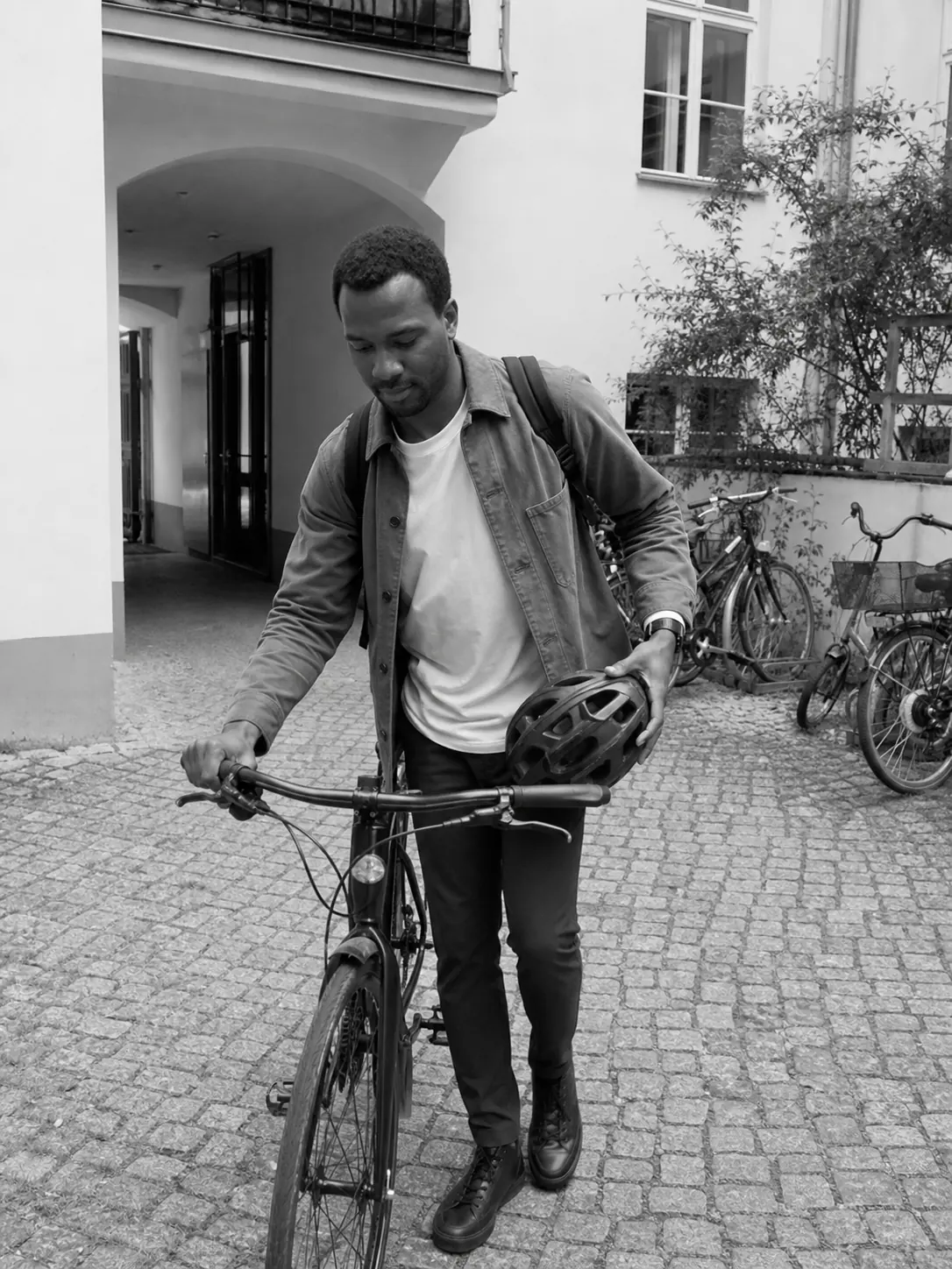 Illustrative profile of Daniel with his bicycle