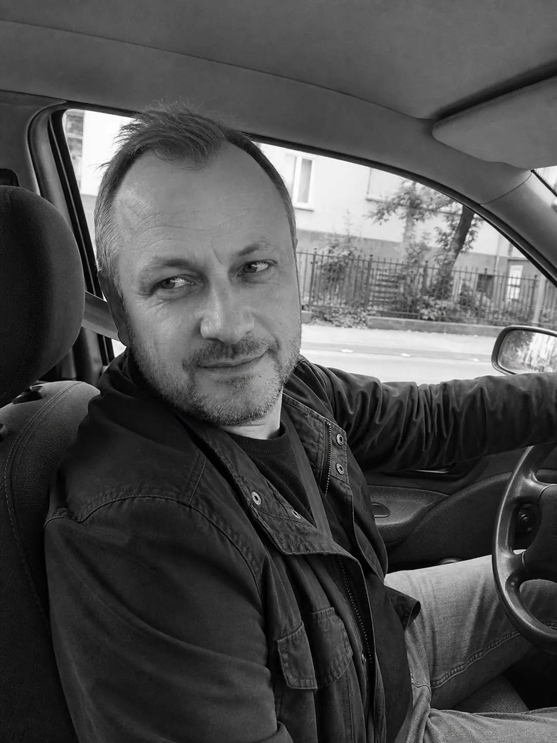 Illustrative profile of Marek in his car